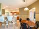Kitchen and dining area with wooden table and chairs at 1033 Sw 159Th St, Ocala, FL 34473