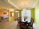 Bright dining area with a wooden table and chairs at 1033 Sw 159Th St, Ocala, FL 34473