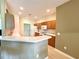 Spacious kitchen with wood cabinets, ample counter space, and modern appliances at 1033 Sw 159Th St, Ocala, FL 34473