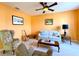 Cozy living room with comfy seating and a guitar at 1033 Sw 159Th St, Ocala, FL 34473