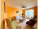 Bright living room with comfy seating and access to kitchen at 1033 Sw 159Th St, Ocala, FL 34473