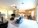 Open concept living room, kitchen, and dining area at 1033 Sw 159Th St, Ocala, FL 34473
