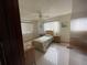 Cozy bedroom with a twin bed and wood furniture at 10949 Sw 79Th Ter, Ocala, FL 34476