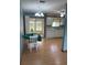 Cozy eat-in kitchen with adjacent screened porch with lots of natural light at 10949 Sw 79Th Ter, Ocala, FL 34476