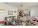 Open living room featuring a view into the kitchen at 11702 Se 173Rd Lane Rd, Summerfield, FL 34491