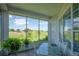 Screened porch overlooking the backyard at 11702 Se 173Rd Lane Rd, Summerfield, FL 34491