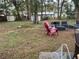 Large backyard with patio furniture and a shed at 14118 Se 45Th Ct, Summerfield, FL 34491