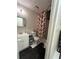 Clean bathroom with white vanity and shower/tub at 14118 Se 45Th Ct, Summerfield, FL 34491