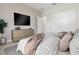 Bedroom with a bed, dresser, and a TV at 16019 Sw 42Nd Ter, Ocala, FL 34473
