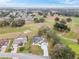 Aerial view of property highlighting location near golf course at 17999 Se 99Th Ave, Summerfield, FL 34491