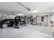 Attached garage has room for two cars and extra storage at 17999 Se 99Th Ave, Summerfield, FL 34491