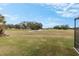 Peaceful view of the golf course from backyard at 17999 Se 99Th Ave, Summerfield, FL 34491