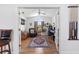 Bright home office with built-in shelving and hardwood floors at 17999 Se 99Th Ave, Summerfield, FL 34491