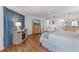 Main bedroom with king-size bed, TV, and ample closet space at 17999 Se 99Th Ave, Summerfield, FL 34491