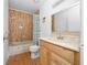 Simple bathroom with shower/tub combo and wood vanity at 20 Pine Trace Run, Ocala, FL 34472