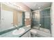 A clean bathroom with a single sink, tiled shower-tub combo, and modern fixtures at 2105 Sw 4Th St, Ocala, FL 34471