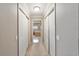 Hallway leading to the bathroom, with two closets on either side at 2105 Sw 4Th St, Ocala, FL 34471