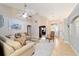 Bright living room featuring tile floors, neutral tones and ample seating at 2105 Sw 4Th St, Ocala, FL 34471