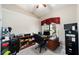 Functional home office with a traditional desk, ample storage and a window with custom valances at 2105 Sw 4Th St, Ocala, FL 34471
