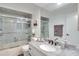 Clean bathroom with granite countertop and shower/tub combo at 2263 Se Laurel Run Dr, Ocala, FL 34471