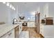 Modern kitchen with stainless steel appliances and granite countertops at 2263 Se Laurel Run Dr, Ocala, FL 34471