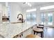 Spacious kitchen with granite countertops and stainless steel appliances at 2263 Se Laurel Run Dr, Ocala, FL 34471