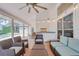 Covered patio overlooking a refreshing pool and spa at 2263 Se Laurel Run Dr, Ocala, FL 34471