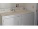 Laundry room with washer and dryer at 321 Katherine Pl, The Villages, FL 32162