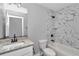 Bathroom features a bathtub and granite vanity at 4065 Sw 5Th Ave, Ocala, FL 34471