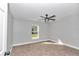 Spacious bedroom with ceiling fan and carpet at 4065 Sw 5Th Ave, Ocala, FL 34471
