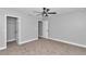 Bedroom with ceiling fan and walk-in closet at 4065 Sw 5Th Ave, Ocala, FL 34471