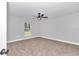 Spacious bedroom with neutral walls, carpeted floor, and ceiling fan at 4065 Sw 5Th Ave, Ocala, FL 34471