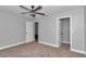 Bedroom with ceiling fan and walk in closet at 4065 Sw 5Th Ave, Ocala, FL 34471