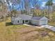 Beautiful home with a well-maintained lawn, concrete driveway, and lovely landscaping at 4065 Sw 5Th Ave, Ocala, FL 34471