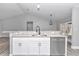 Kitchen island with granite countertop, sink, and dishwasher at 4065 Sw 5Th Ave, Ocala, FL 34471