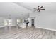Open living room with high ceilings, LVP flooring, and recessed lighting at 4065 Sw 5Th Ave, Ocala, FL 34471