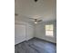 Spacious bedroom with double door closet and ceiling fan at 4698 Sw Zinnia, Dunnellon, FL 34431