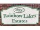 Community entrance sign for Rainbow Lakes Estates at 4698 Sw Zinnia, Dunnellon, FL 34431