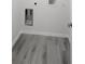 Laundry room with vinyl flooring and built in shelving at 4698 Sw Zinnia, Dunnellon, FL 34431