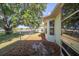 Spacious backyard with chain link fence, mature trees, and lush greenery offering great privacy at 6184 Sw 101St Pl, Ocala, FL 34476