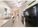 Well-lit kitchen with ample counter space, efficient appliances, and a functional layout for easy meal prep at 6184 Sw 101St Pl, Ocala, FL 34476