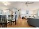 Bright living space flowing into dining area, featuring neutral tones and a seamless, airy design at 6184 Sw 101St Pl, Ocala, FL 34476