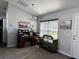 Dining room with wooden desk and wall art at 6671 Se 108Th St, Belleview, FL 34420