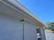 House exterior with security camera and gray siding at 6671 Se 108Th St, Belleview, FL 34420