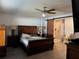 Main bedroom with barn door and ensuite bath at 6671 Se 108Th St, Belleview, FL 34420