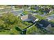 Aerial view showing house, pool, and neighborhood at 772 Horseman Dr, Port Orange, FL 32127