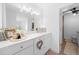 Bright bathroom boasts a vanity with a marble countertop at 772 Horseman Dr, Port Orange, FL 32127