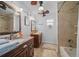 Double vanity bathroom with marble countertops and a large tub at 772 Horseman Dr, Port Orange, FL 32127