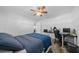 Comfortable bedroom with ceiling fan and plenty of closet space at 772 Horseman Dr, Port Orange, FL 32127