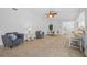 Bright living room with tile floors and comfortable seating at 772 Horseman Dr, Port Orange, FL 32127